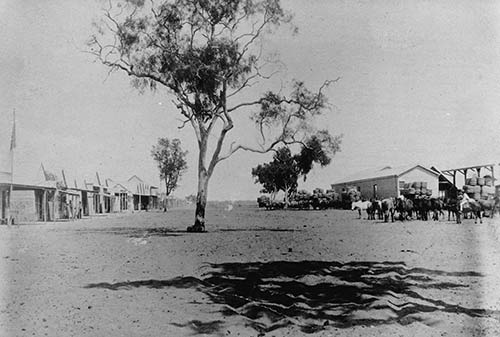 Wool bales at the railway station goods shed